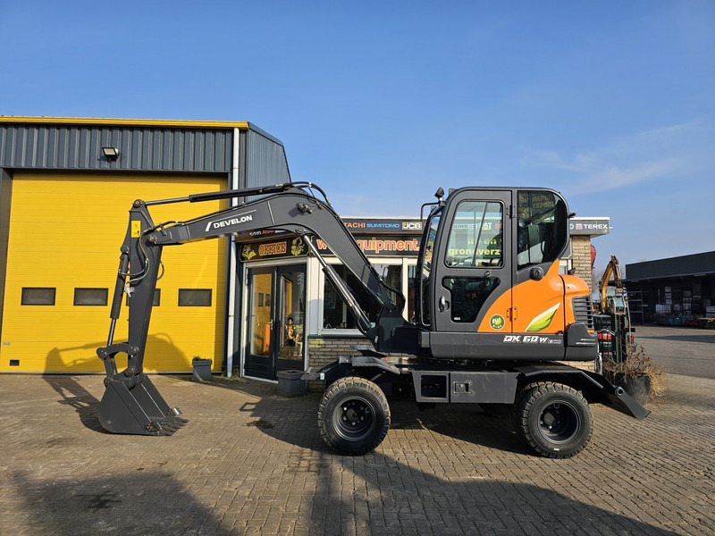 Develon DX60WN ECO-1 - Kolesové rýpadlo: obrázek 1 Develon DX60WN ECO-1 - Kolesové rýpadlo: obrázek 1