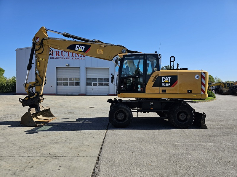 CATERPILLAR M320F - Kolesové rýpadlo: obrázek 2 CATERPILLAR M320F - Kolesové rýpadlo: obrázek 2