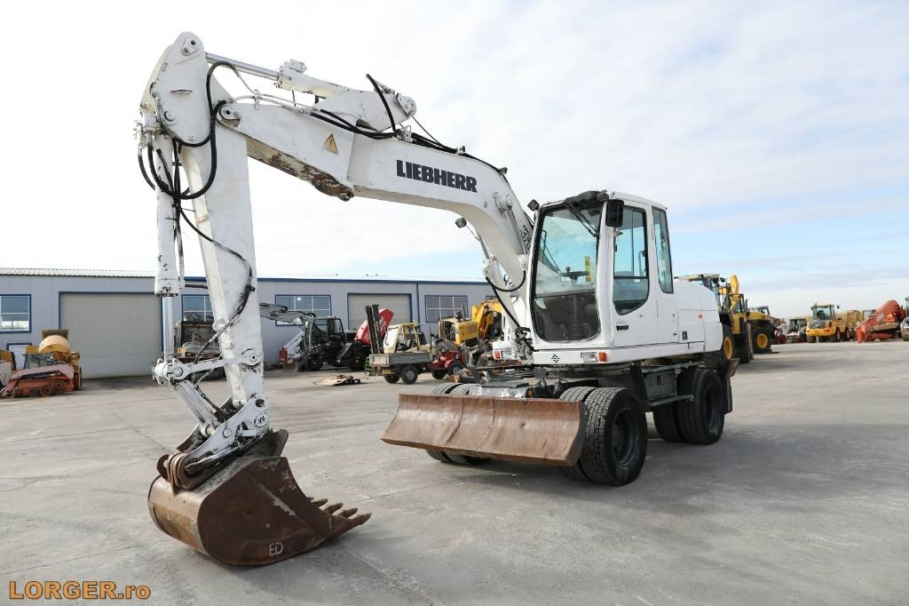 Liebherr A 316 Litronic - Kolesové rýpadlo: obrázek 1 Liebherr A 316 Litronic - Kolesové rýpadlo: obrázek 1