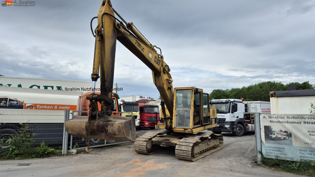 CAT 215 DLC Zustand normal, Hydraulik trocken - Pásové rýpadlo: obrázek 1 CAT 215 DLC Zustand normal, Hydraulik trocken - Pásové rýpadlo: obrázek 1