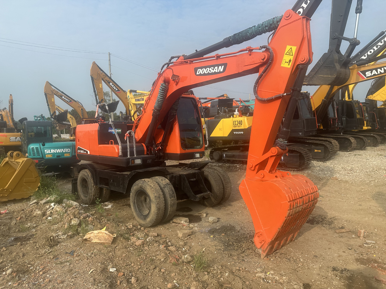 Doosan DX150W-9C - Kolesové rýpadlo: obrázek 2 Doosan DX150W-9C - Kolesové rýpadlo: obrázek 2