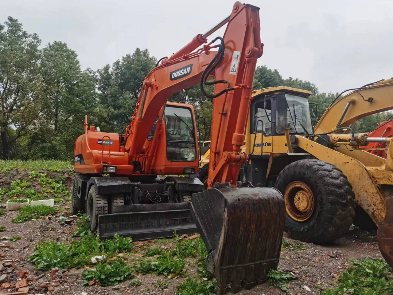 DOOSAN DH150W-7 - Kolesové rýpadlo: obrázek 1 DOOSAN DH150W-7 - Kolesové rýpadlo: obrázek 1