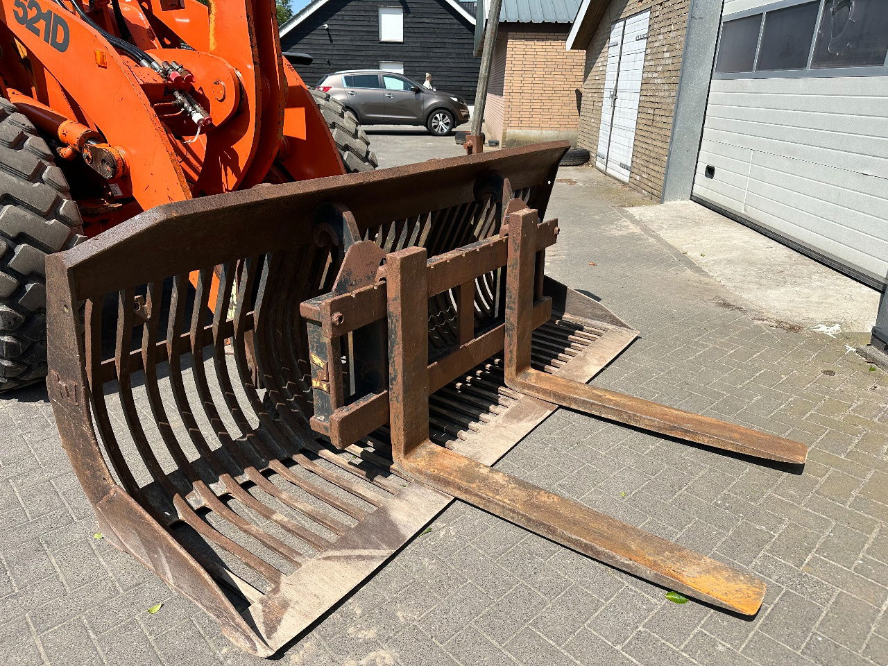 Kolový nakladač Case 521D: obrázek 17