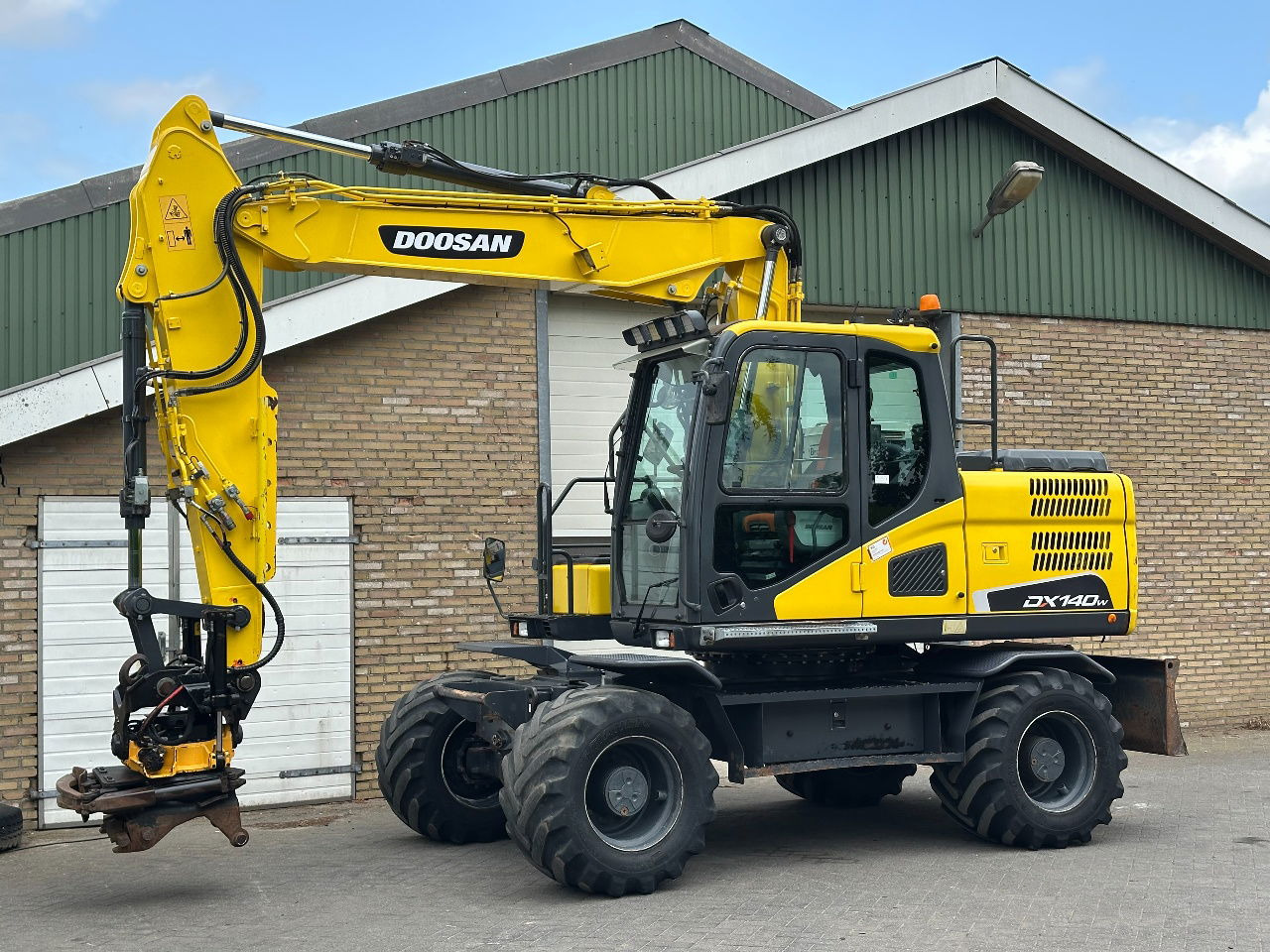 Doosan DX140W-5 - Kolesové rýpadlo: obrázek 2 Doosan DX140W-5 - Kolesové rýpadlo: obrázek 2