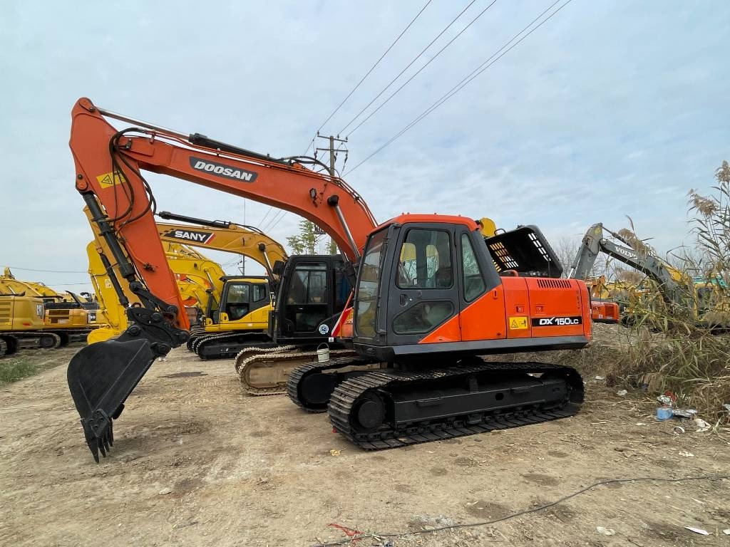 Doosan dx150 - Pásové rýpadlo: obrázek 1 Doosan dx150 - Pásové rýpadlo: obrázek 1