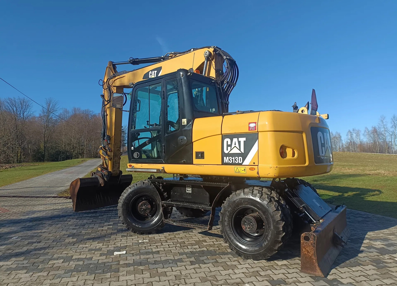 CATERPILLAR M313D - Kolesové rýpadlo: obrázek 1 CATERPILLAR M313D - Kolesové rýpadlo: obrázek 1