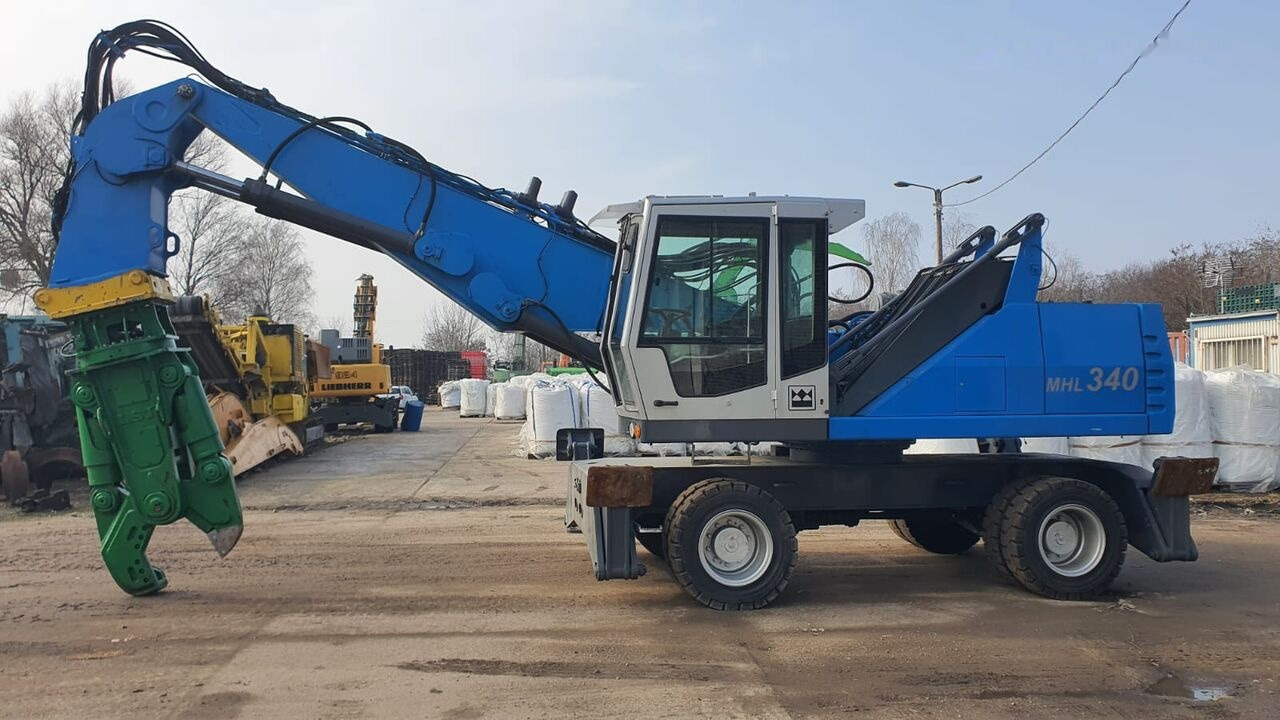 Fuchs MHL 340D FQC + LST 3to shear - Překládkové rypadlo: obrázek 1 Fuchs MHL 340D FQC + LST 3to shear - Překládkové rypadlo: obrázek 1