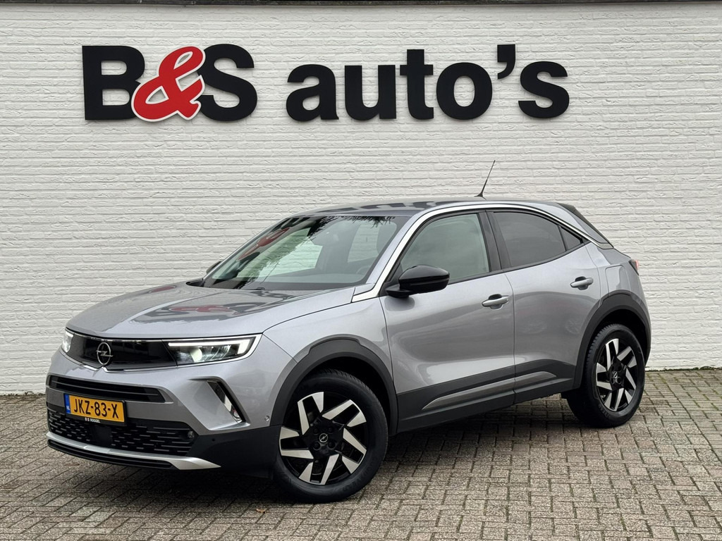 Opel Mokka-1.2 Turbo Elegance Cruise control Climate control Stoel- stuurverwarming Apple / Android Parkeersensoren plus camera - SUV: obrázek 1 Opel Mokka-1.2 Turbo Elegance Cruise control Climate control Stoel- stuurverwarming Apple / Android Parkeersensoren plus camera - SUV: obrázek 1