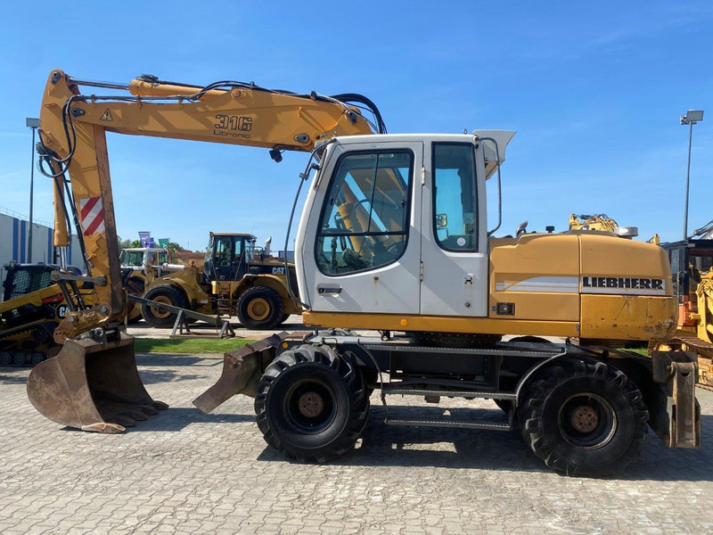 Liebherr A316 Litronic A 316 litronic - Kolesové rýpadlo: obrázek 2 Liebherr A316 Litronic A 316 litronic - Kolesové rýpadlo: obrázek 2