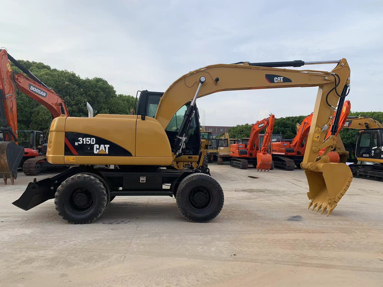 CATERPILLAR 315D - Kolesové rýpadlo: obrázek 1 CATERPILLAR 315D - Kolesové rýpadlo: obrázek 1