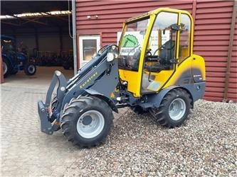 Eurotrac W12 med førerhus - Kloubový nakladač: obrázek 1 Eurotrac W12 med førerhus - Kloubový nakladač: obrázek 1