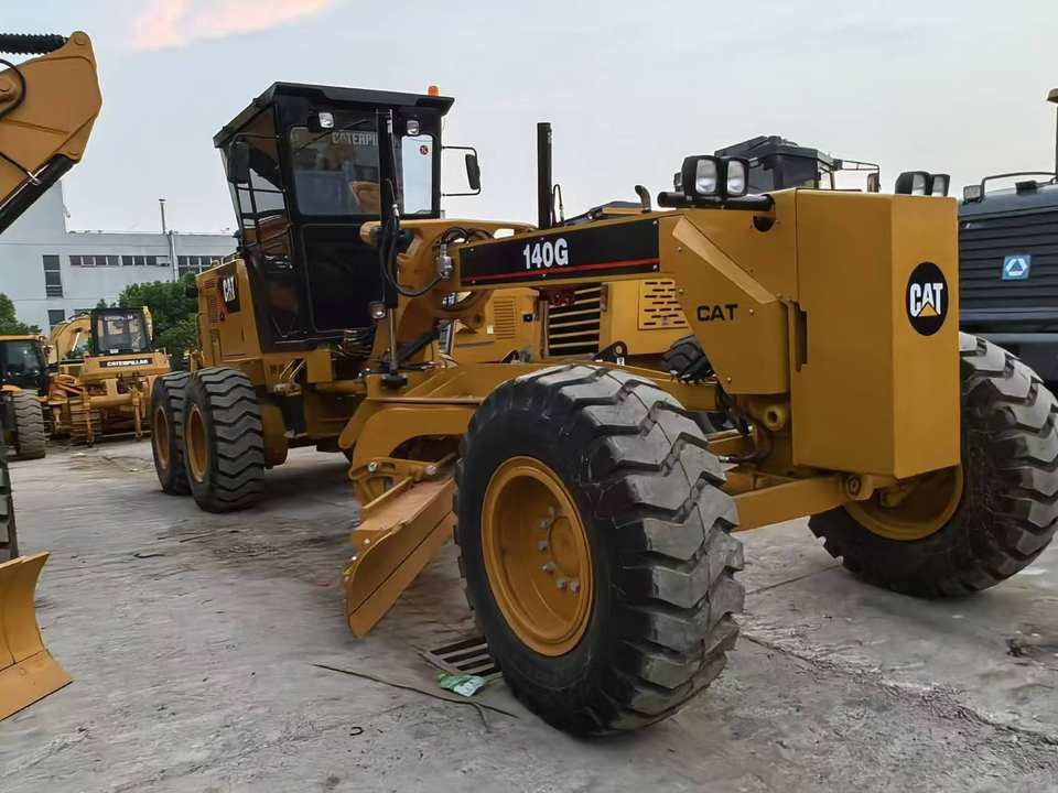 Second Hand Used Construction Machinery Japanese CAT 140G Grader Caterpillar Brand for Sale With Good Condition and Price - Grejdr: obrázek 4 Second Hand Used Construction Machinery Japanese CAT 140G Grader Caterpillar Brand for Sale With Good Condition and Price - Grejdr: obrázek 4