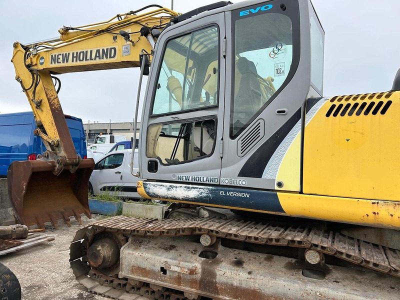 New Holland E215B - Rýpadlo: obrázek 4 New Holland E215B - Rýpadlo: obrázek 4