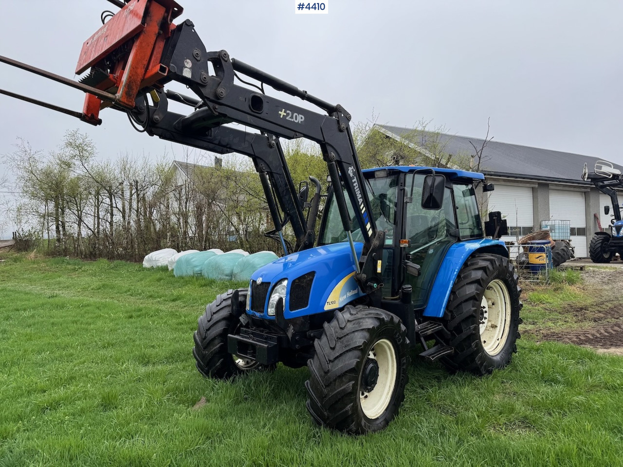 2006 New Holland TL100 A w/Front Loader. - Traktor: obrázek 1 2006 New Holland TL100 A w/Front Loader. - Traktor: obrázek 1