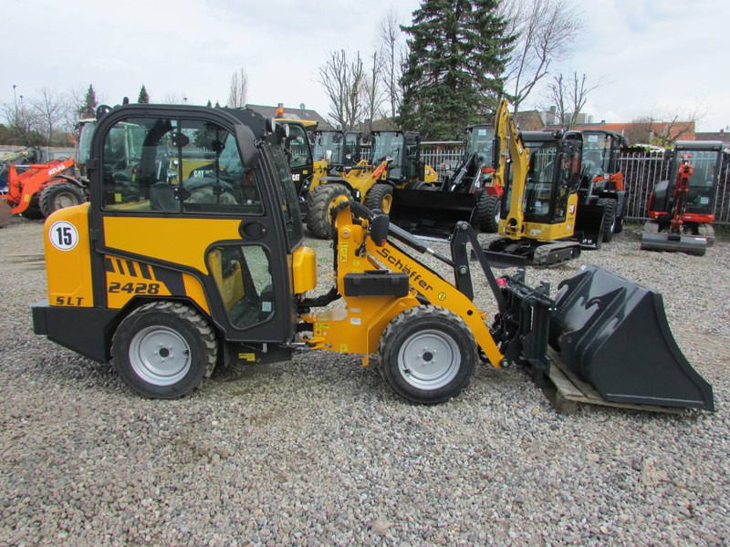 Schäffer 2428 SLT Schmalspur Radlader 32.500 Schaeffer - Smykem řízený nakladač pásový: obrázek 2 Schäffer 2428 SLT Schmalspur Radlader 32.500 Schaeffer - Smykem řízený nakladač pásový: obrázek 2