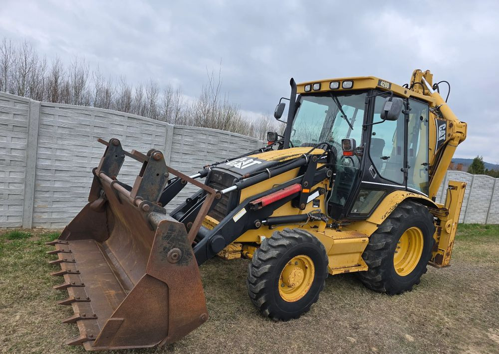 Caterpillar - Rýpadlo-nakladač: obrázek 1 Caterpillar - Rýpadlo-nakladač: obrázek 1