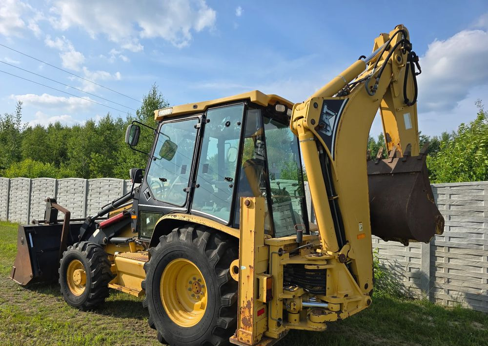 Rýpadlo-nakladač Caterpillar: obrázek 6