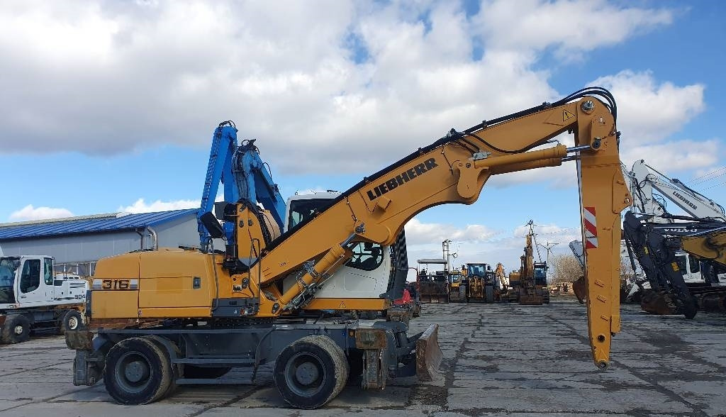 Liebherr A 316 Litronic - Překládkové rypadlo: obrázek 5 Liebherr A 316 Litronic - Překládkové rypadlo: obrázek 5
