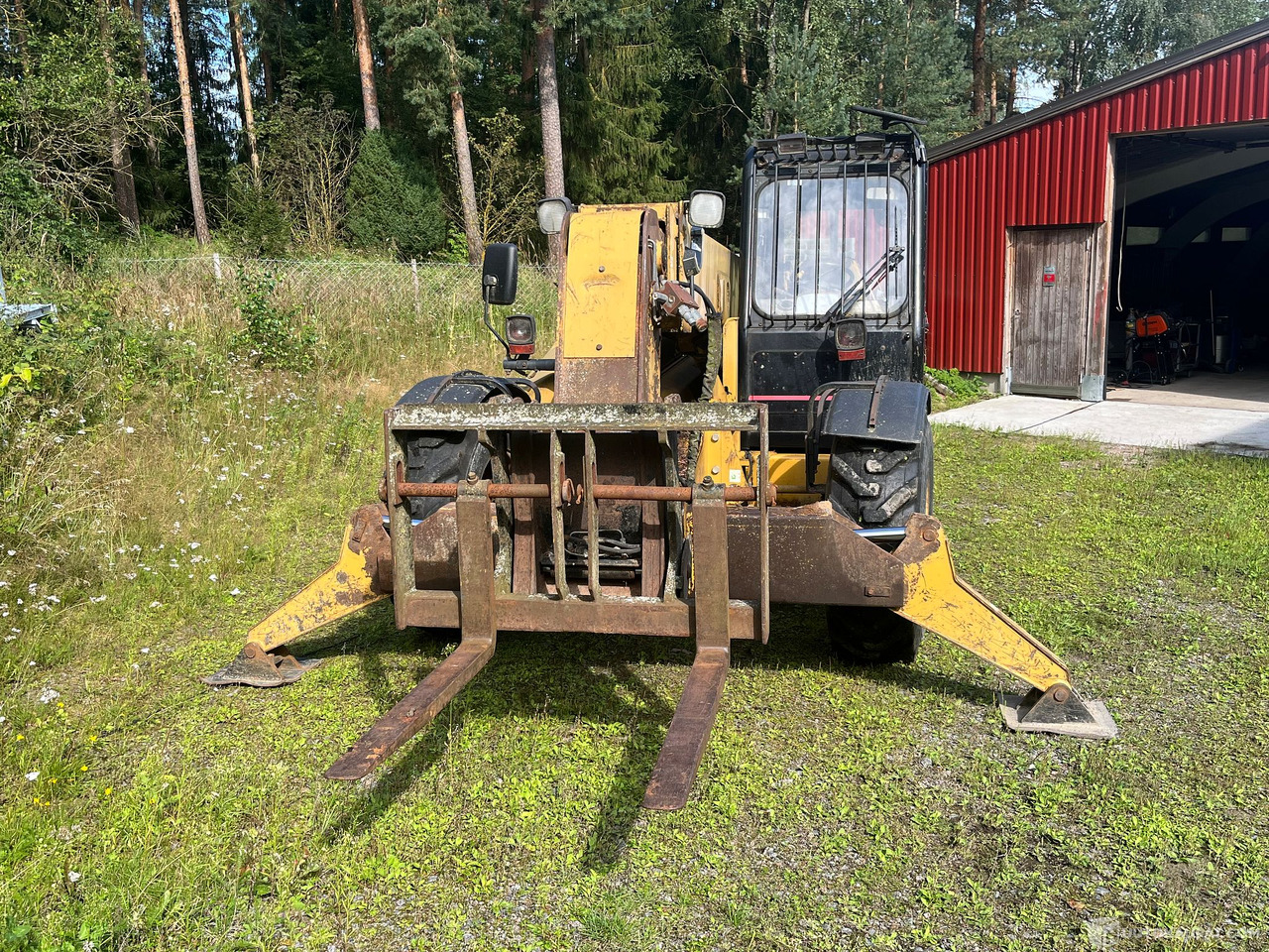 Caterpillar TH63, kurottaja piikeillä ja kauhalla, 2002, Loppi - Zemědělská technika: obrázek 4 Caterpillar TH63, kurottaja piikeillä ja kauhalla, 2002, Loppi - Zemědělská technika: obrázek 4