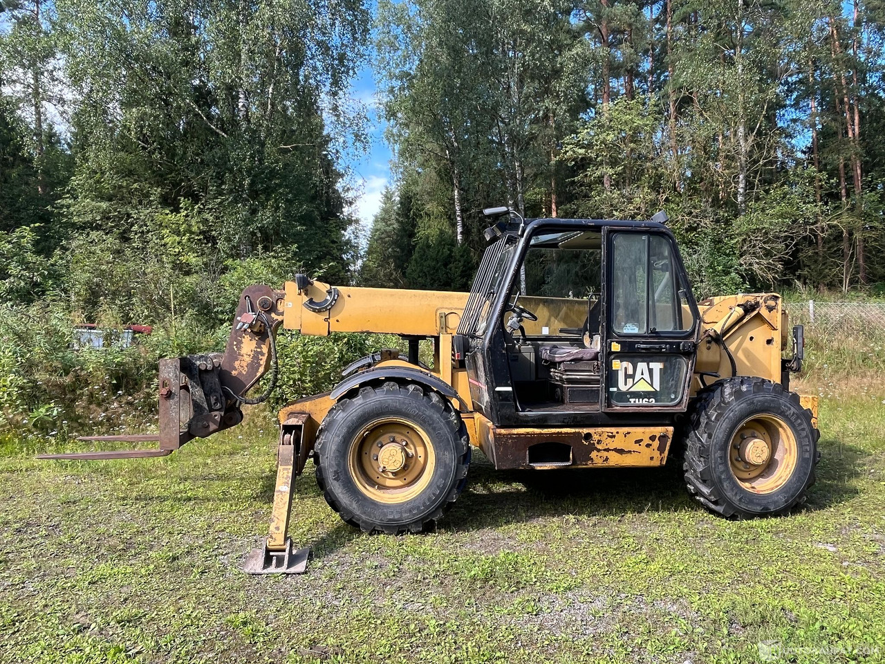 Caterpillar TH63, kurottaja piikeillä ja kauhalla, 2002, Loppi - Zemědělská technika: obrázek 2 Caterpillar TH63, kurottaja piikeillä ja kauhalla, 2002, Loppi - Zemědělská technika: obrázek 2