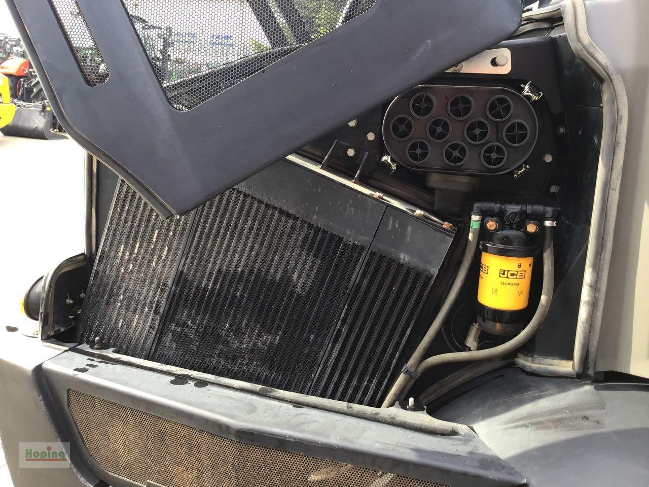 Kolový nakladač JCB 409: obrázek 10