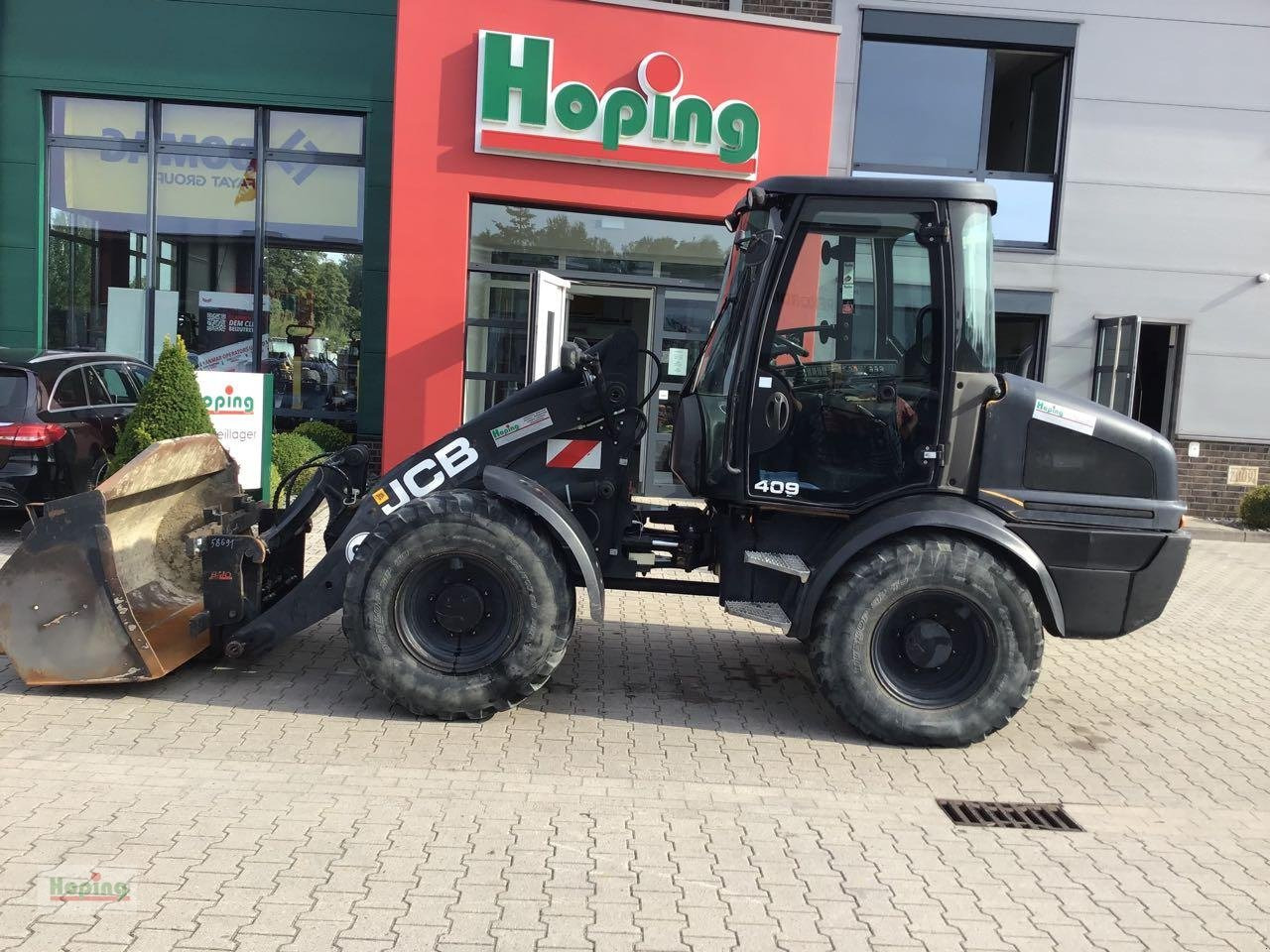 JCB 409 - Kolový nakladač: obrázek 1 JCB 409 - Kolový nakladač: obrázek 1