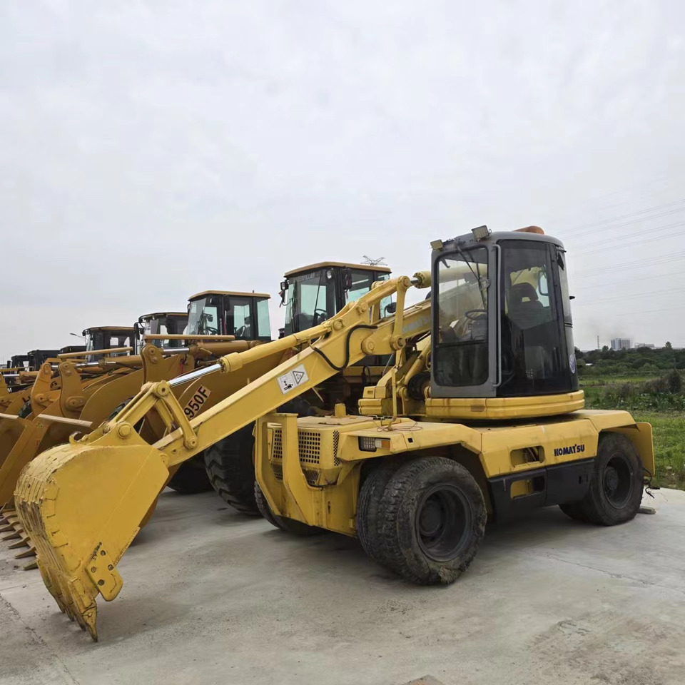 KOMATSU PC128US - Kolesové rýpadlo: obrázek 1 KOMATSU PC128US - Kolesové rýpadlo: obrázek 1