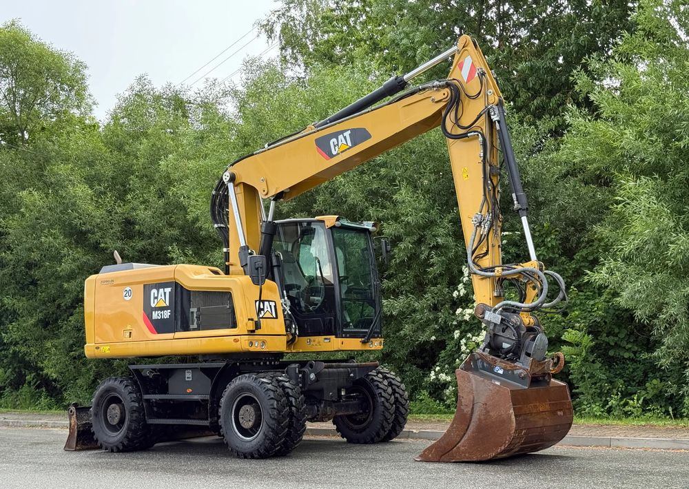Caterpillar CAT 318 F * Powertilt * Sprowadzony* 9700 MTG * Caterpillar * Stan Perfekcyjny - Kolesové rýpadlo: obrázek 2 Caterpillar CAT 318 F * Powertilt * Sprowadzony* 9700 MTG * Caterpillar * Stan Perfekcyjny - Kolesové rýpadlo: obrázek 2