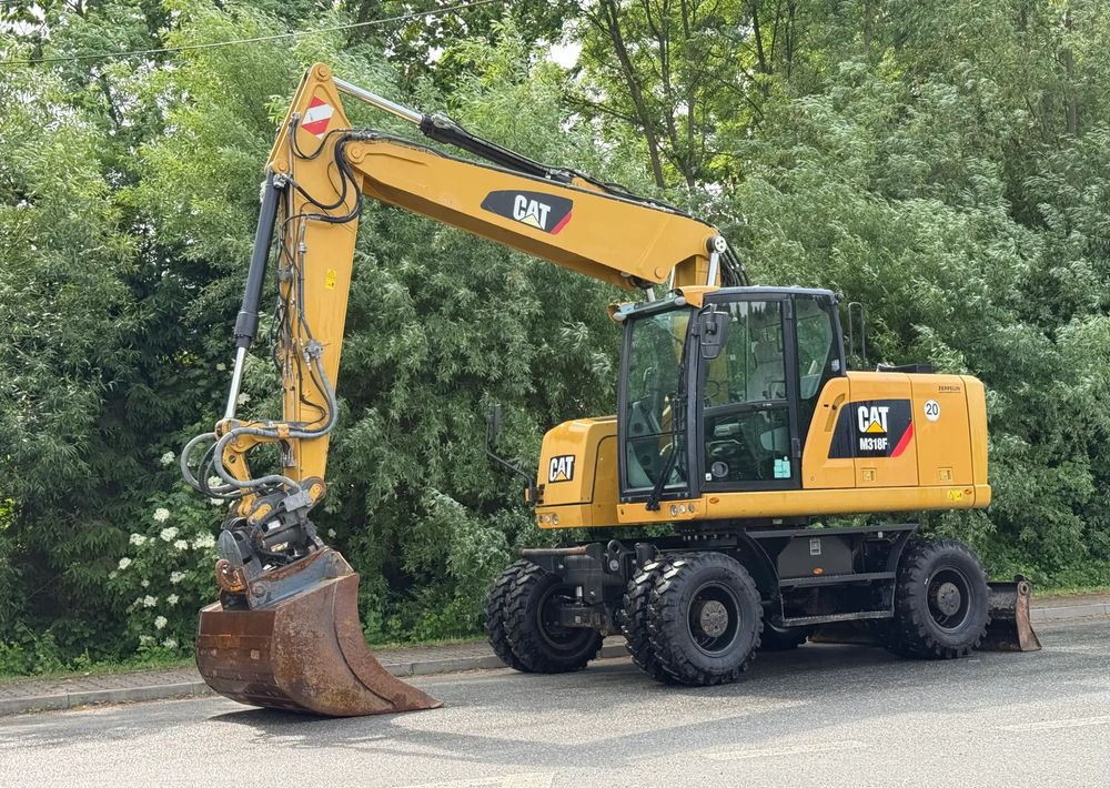 Caterpillar CAT 318 F * Powertilt * Sprowadzony* 9700 MTG * Caterpillar * Stan Perfekcyjny - Kolesové rýpadlo: obrázek 1 Caterpillar CAT 318 F * Powertilt * Sprowadzony* 9700 MTG * Caterpillar * Stan Perfekcyjny - Kolesové rýpadlo: obrázek 1