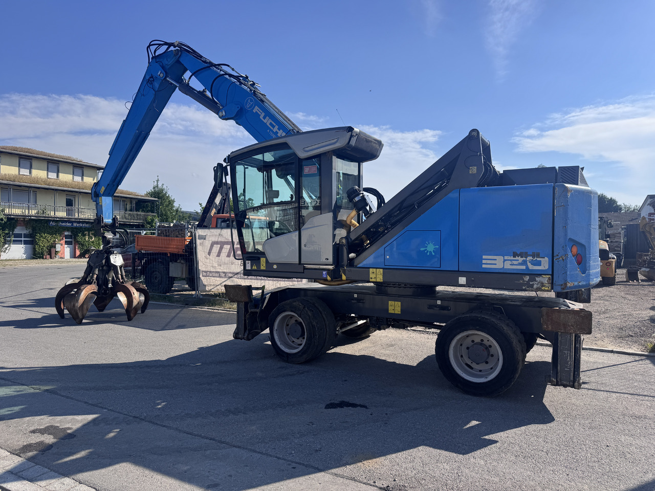 FUCHS MHL 320 F - Překládkové rypadlo: obrázek 1 FUCHS MHL 320 F - Překládkové rypadlo: obrázek 1