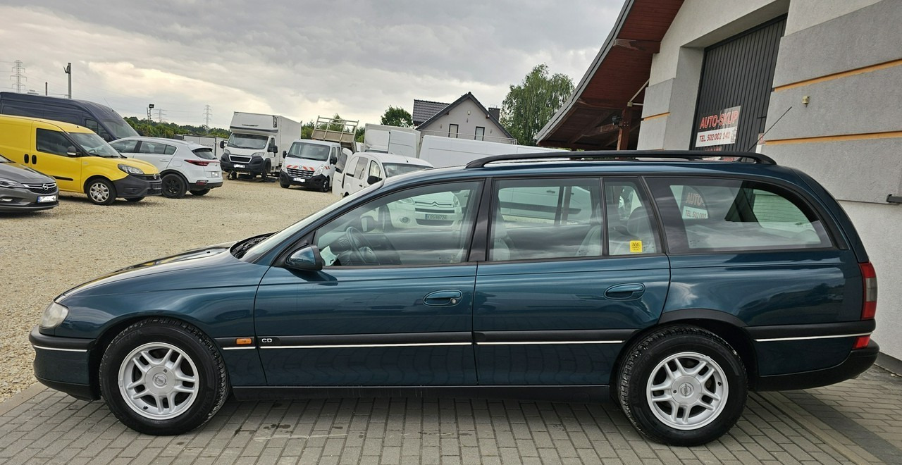 Opel Omega B 2,5 v6 *automat* napęd tył *welury* - Osobní auto: obrázek 4 Opel Omega B 2,5 v6 *automat* napęd tył *welury* - Osobní auto: obrázek 4