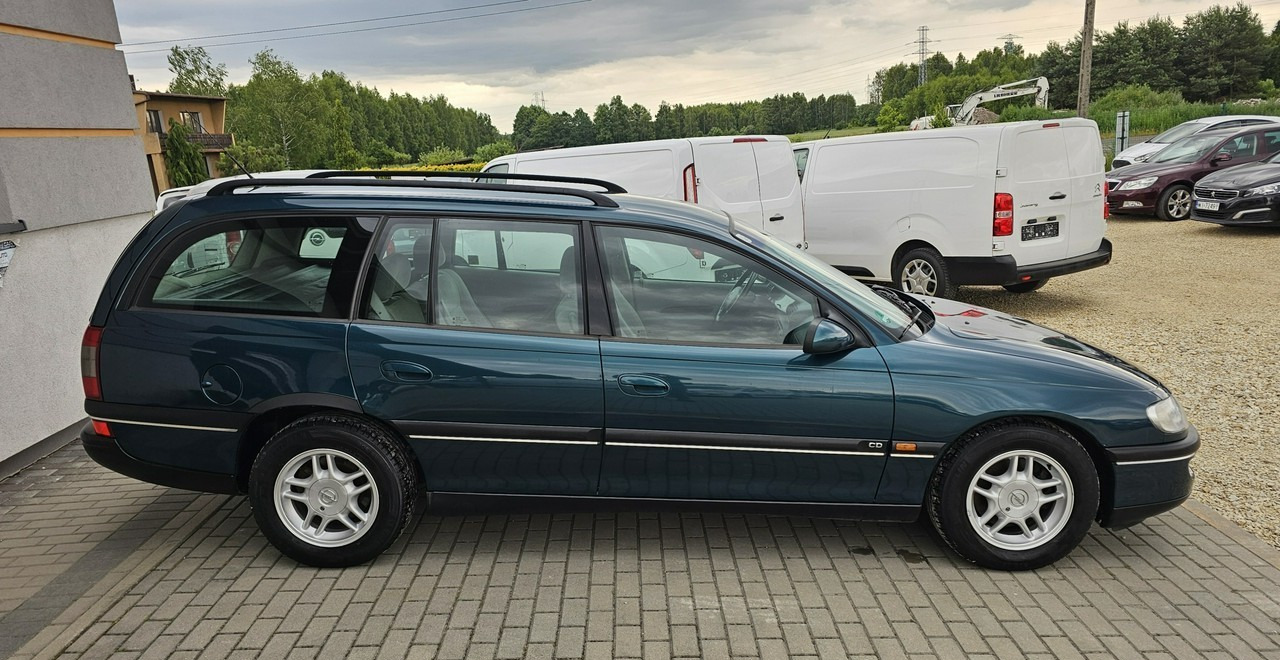 Opel Omega B 2,5 v6 *automat* napęd tył *welury* - Osobní auto: obrázek 5 Opel Omega B 2,5 v6 *automat* napęd tył *welury* - Osobní auto: obrázek 5