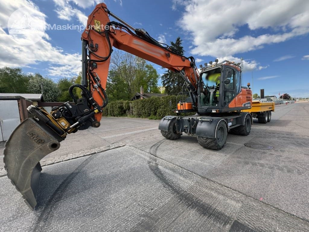 Doosan DX 160 W - Kolesové rýpadlo: obrázek 1 Doosan DX 160 W - Kolesové rýpadlo: obrázek 1