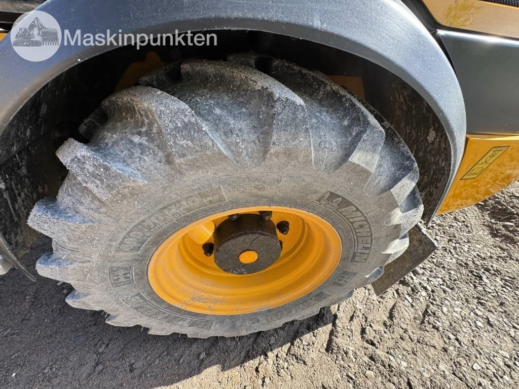 Kolový nakladač JCB 409: obrázek 20