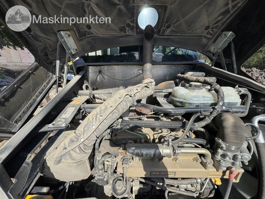 Kolový nakladač JCB 409: obrázek 7