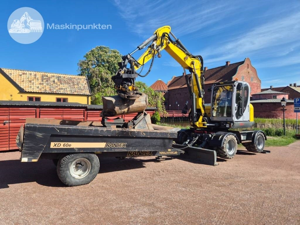 Wacker Neuson EW 100 med vagn - Kolesové rýpadlo: obrázek 1 Wacker Neuson EW 100 med vagn - Kolesové rýpadlo: obrázek 1