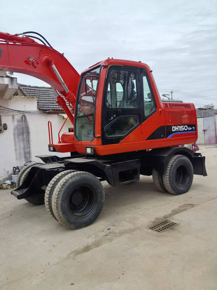 Doosan Used DH150W-7 wheeled excavator for sale at a low price. - Kolesové rýpadlo: obrázek 1 Doosan Used DH150W-7 wheeled excavator for sale at a low price. - Kolesové rýpadlo: obrázek 1