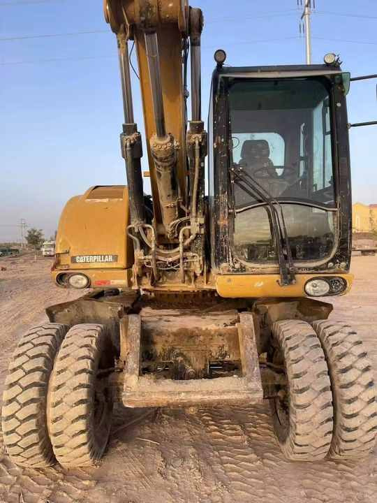 Used Digger Cat 315 Construction Machinery Construction Digger Used Cat 315 Cheap Excavator - Kolesové rýpadlo: obrázek 2 Used Digger Cat 315 Construction Machinery Construction Digger Used Cat 315 Cheap Excavator - Kolesové rýpadlo: obrázek 2