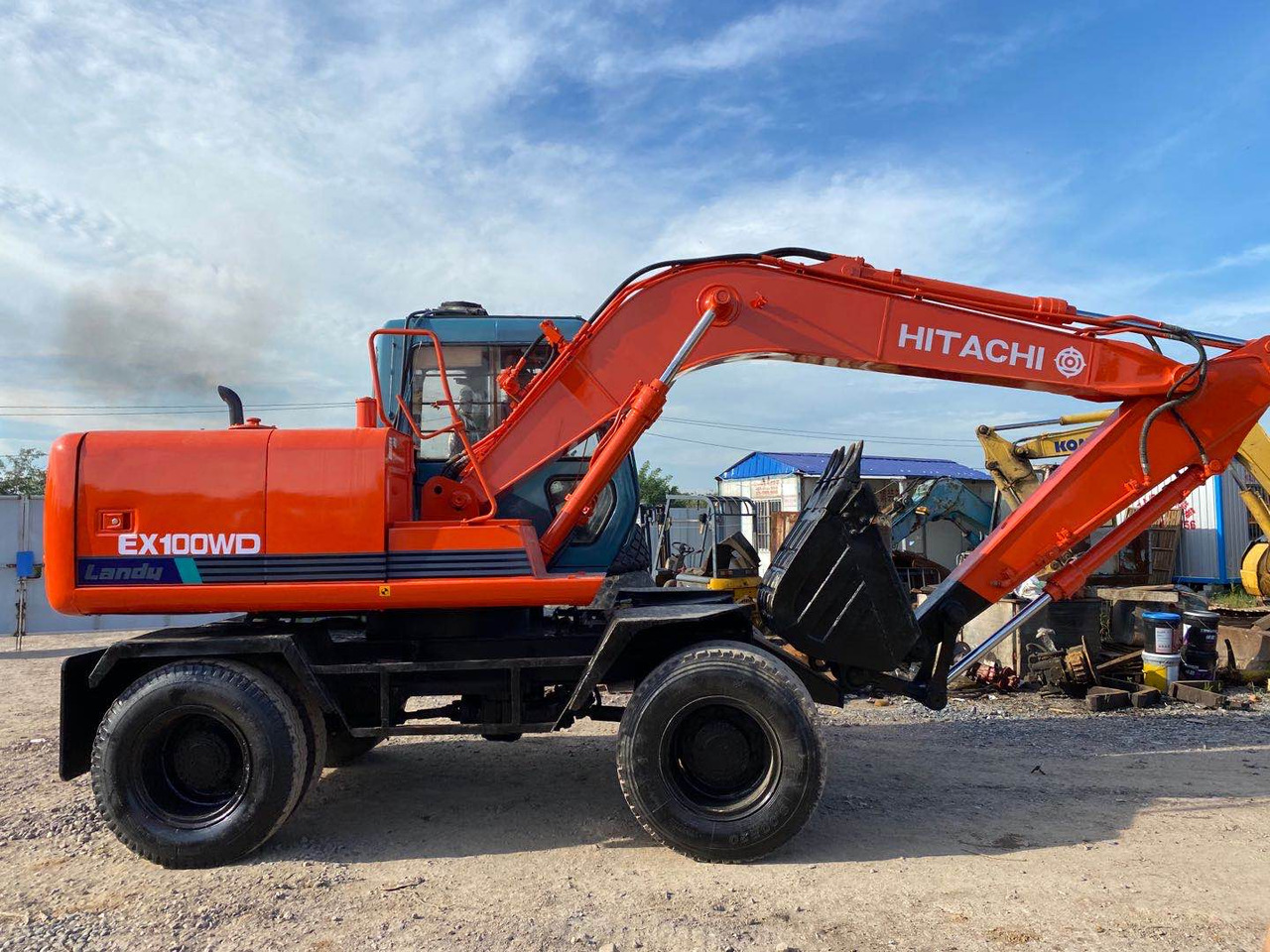 HITACHI EX100WD - Kolesové rýpadlo: obrázek 1 HITACHI EX100WD - Kolesové rýpadlo: obrázek 1