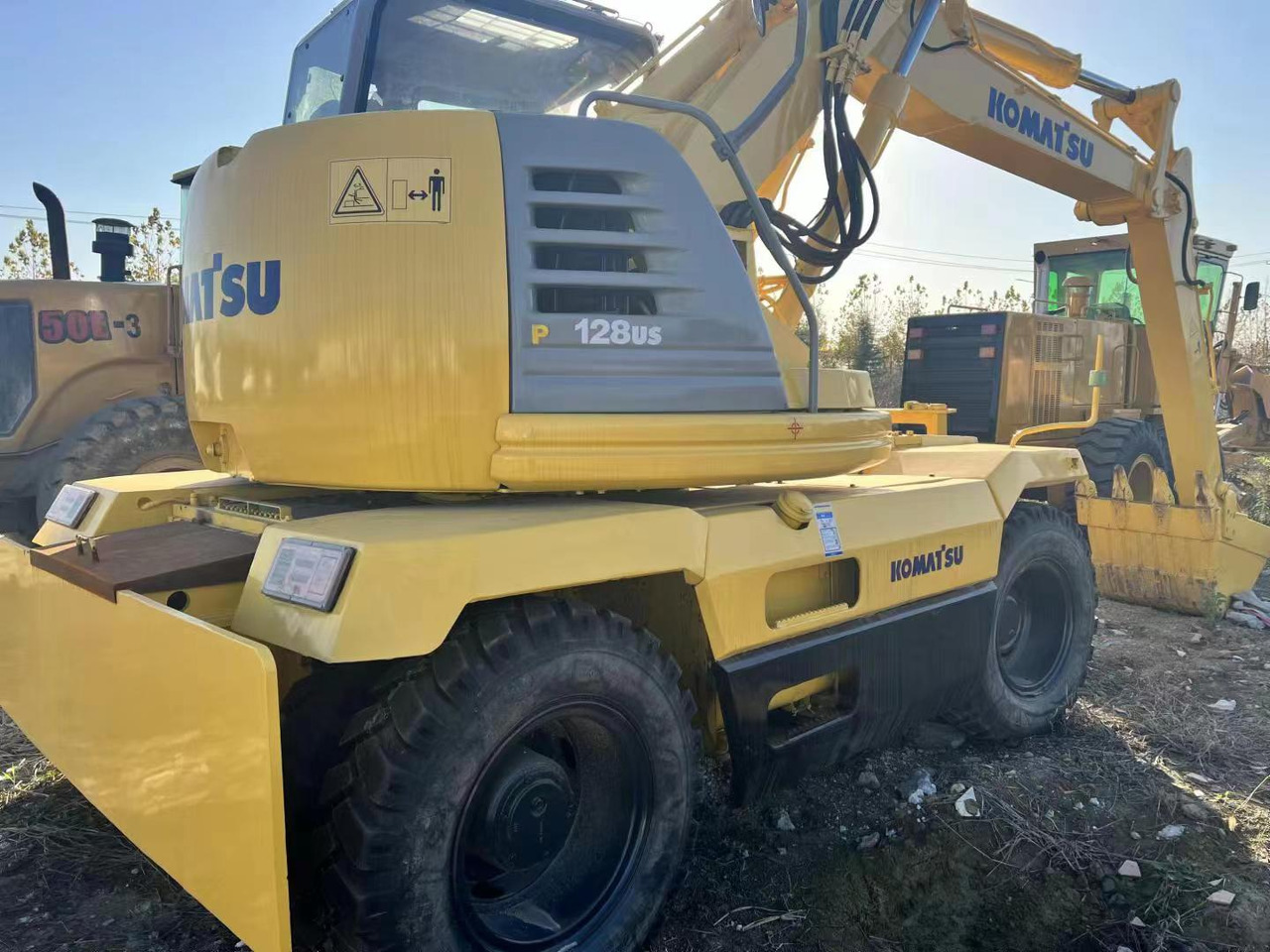 KOMATSU PC128US - Kolesové rýpadlo: obrázek 2 KOMATSU PC128US - Kolesové rýpadlo: obrázek 2