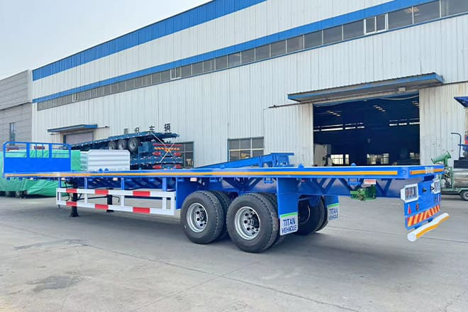 TITAN 2 Axle 45 Ft Flatbed Trailers for Sale in Algeria - Návěs valník/ Plato: obrázek 1 TITAN 2 Axle 45 Ft Flatbed Trailers for Sale in Algeria - Návěs valník/ Plato: obrázek 1