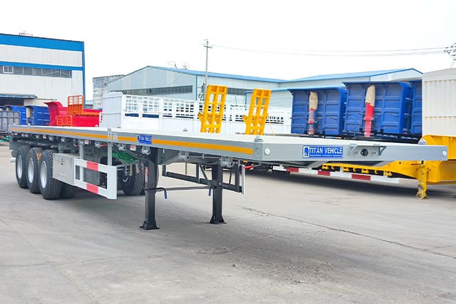 TITAN Tri Axle 40Ft Flatbed Trailer Price for Sale in Sierra Leone - Návěs valník/ Plato: obrázek 1 TITAN Tri Axle 40Ft Flatbed Trailer Price for Sale in Sierra Leone - Návěs valník/ Plato: obrázek 1
