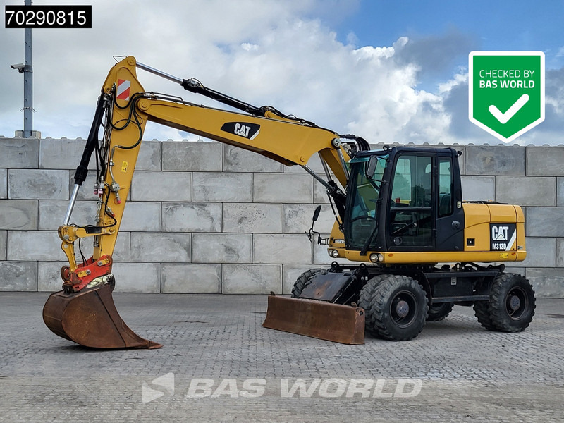 Caterpillar M313 D - Kolesové rýpadlo: obrázek 1 Caterpillar M313 D - Kolesové rýpadlo: obrázek 1