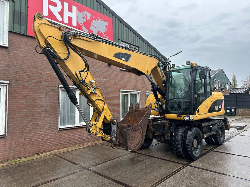 Caterpillar M313D 7212 HOURS - Kolesové rýpadlo: obrázek 2 Caterpillar M313D 7212 HOURS - Kolesové rýpadlo: obrázek 2