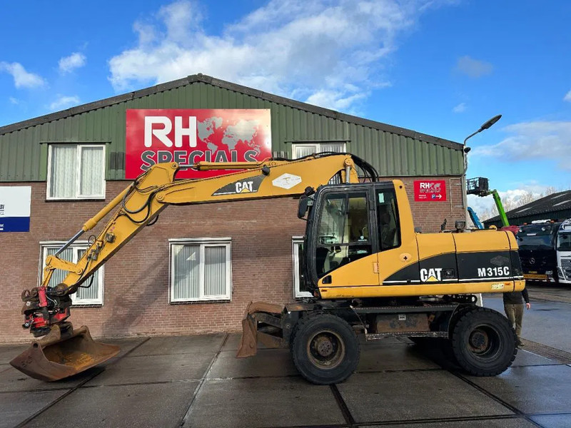 Caterpillar M315C WITH ROTOTILT, CE - Kolesové rýpadlo: obrázek 1 Caterpillar M315C WITH ROTOTILT, CE - Kolesové rýpadlo: obrázek 1