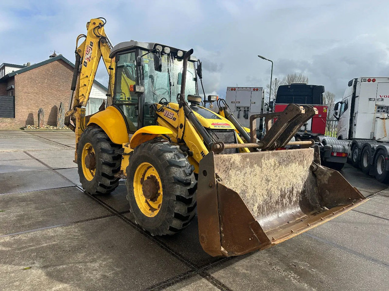New Holland LB115B, CE, 240 MM MULTI PURPOSE LOADER BUCKET, 800 MM BACHOE DIGGING BUCKET, FLIP OVER FORKS, AIR CONDITIONER - Rýpadlo-nakladač: obrázek 5 New Holland LB115B, CE, 240 MM MULTI PURPOSE LOADER BUCKET, 800 MM BACHOE DIGGING BUCKET, FLIP OVER FORKS, AIR CONDITIONER - Rýpadlo-nakladač: obrázek 5