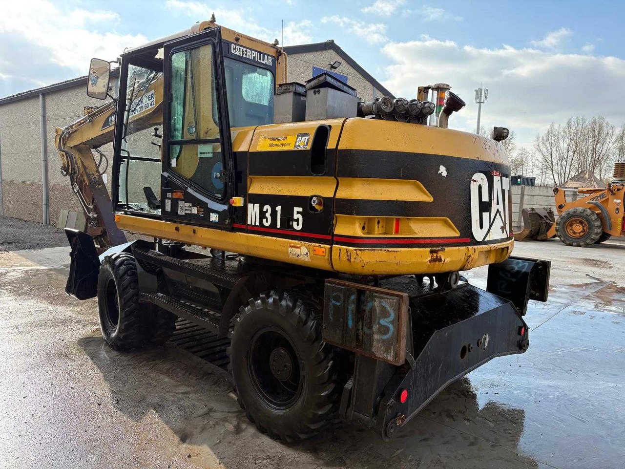 Caterpillar M315 - Kolesové rýpadlo: obrázek 2 Caterpillar M315 - Kolesové rýpadlo: obrázek 2
