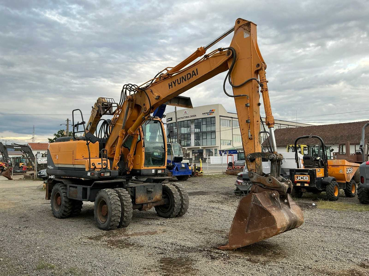 HYUNDAI ROBEX 140W-9 - Kolesové rýpadlo: obrázek 1 HYUNDAI ROBEX 140W-9 - Kolesové rýpadlo: obrázek 1