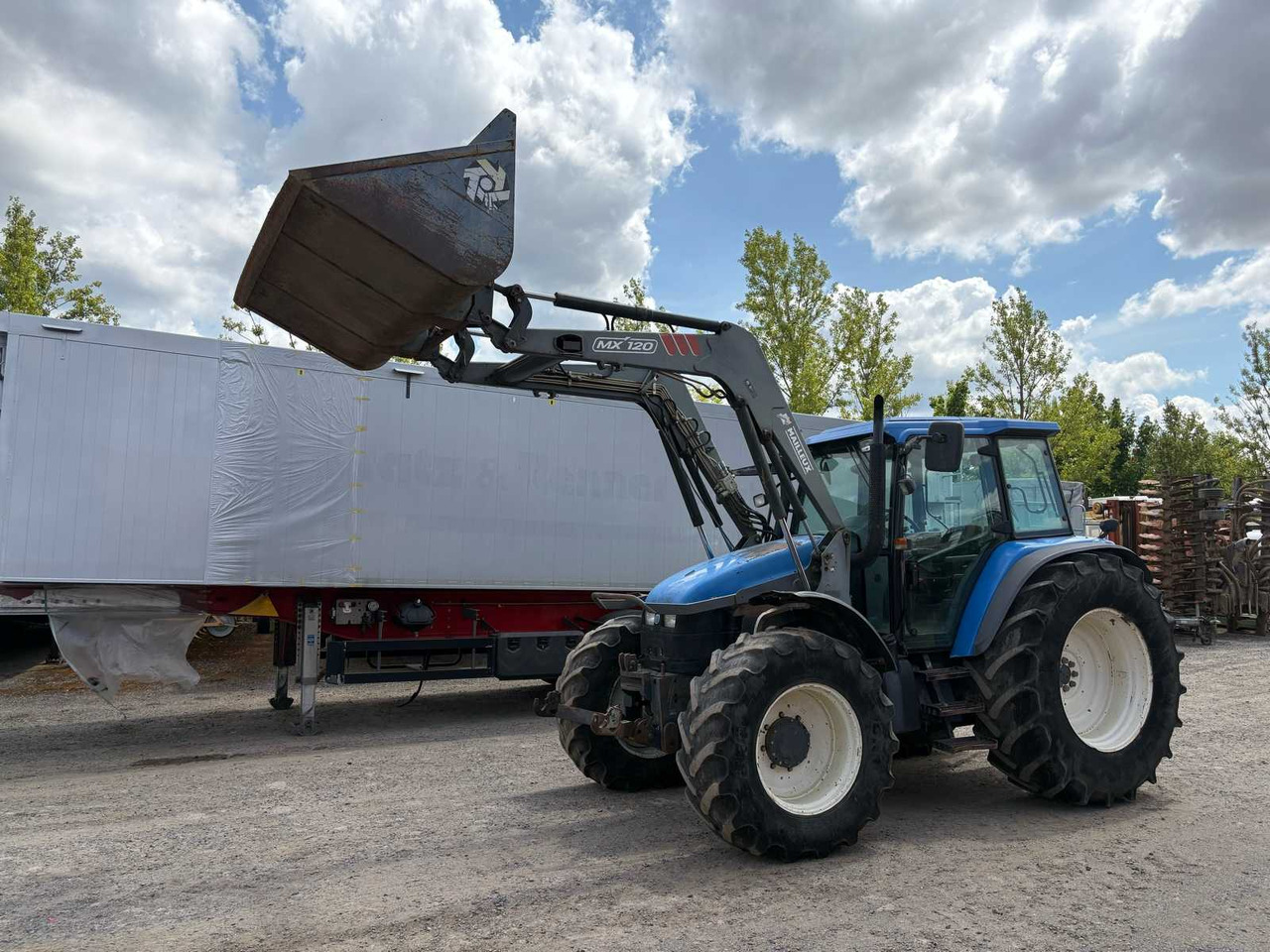 New Holland TM115 mit Frontlader - Traktor: obrázek 1 New Holland TM115 mit Frontlader - Traktor: obrázek 1