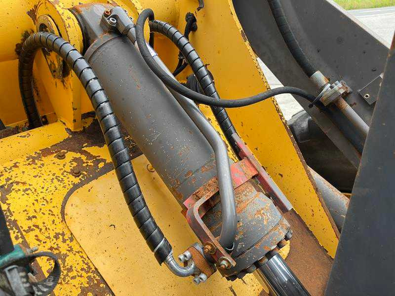 Smykem řízený nakladač pásový VOLVO - L70C - WHEEL LOADER: obrázek 19 Smykem řízený nakladač pásový VOLVO - L70C - WHEEL LOADER: obrázek 19